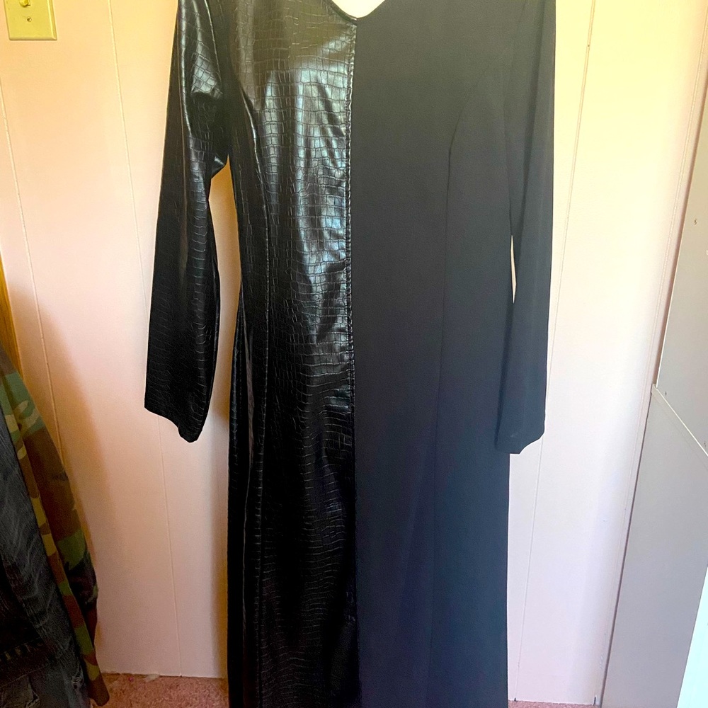 Black faux leather dress. Long sleeve.